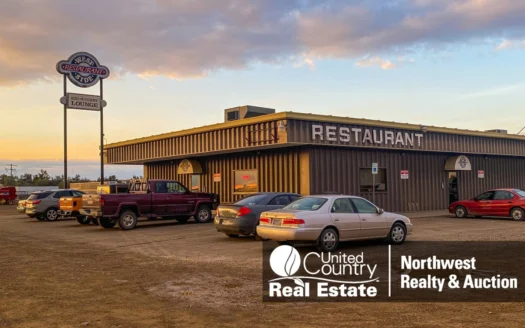 Vacant Low Maintenance Commercial Building with Highway Frontage for Sale