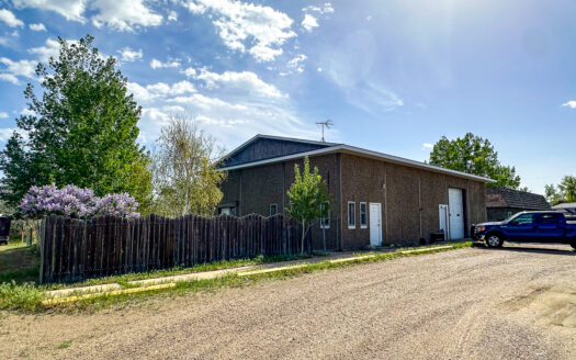 Shop w/ Attached 2-Bedroom Apartment and Off-Street Parking