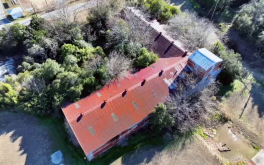 Opportunity awaits with a 12,000 sq ft warehouse located in Meigs