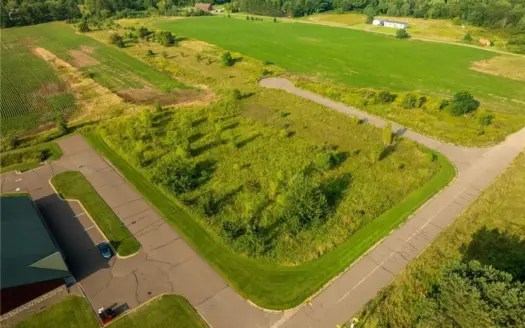 Prime 2.04-Acre Commercial Lot in Mora with Highway Visibility